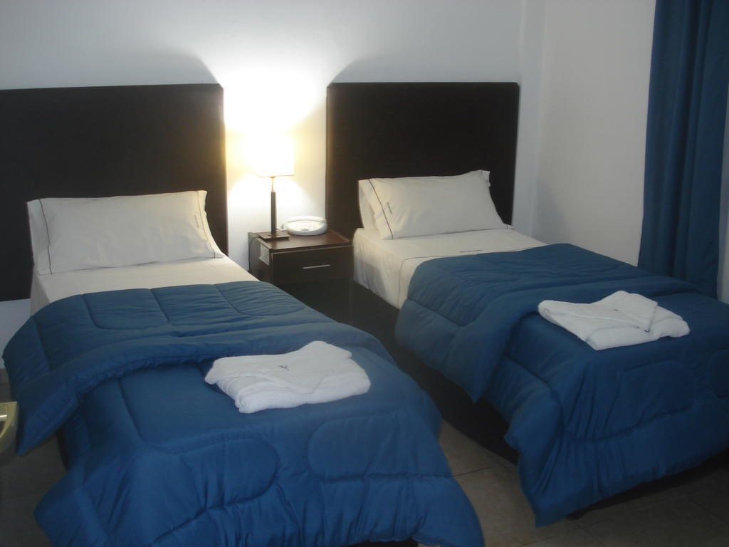 Morada Suites Campana Szoba fotó